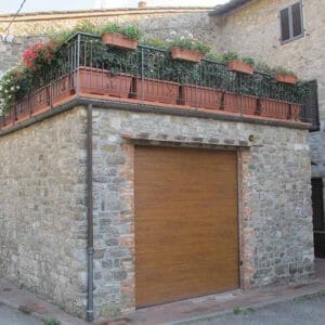 Porta sezionale finto legno - Fiss Firenze